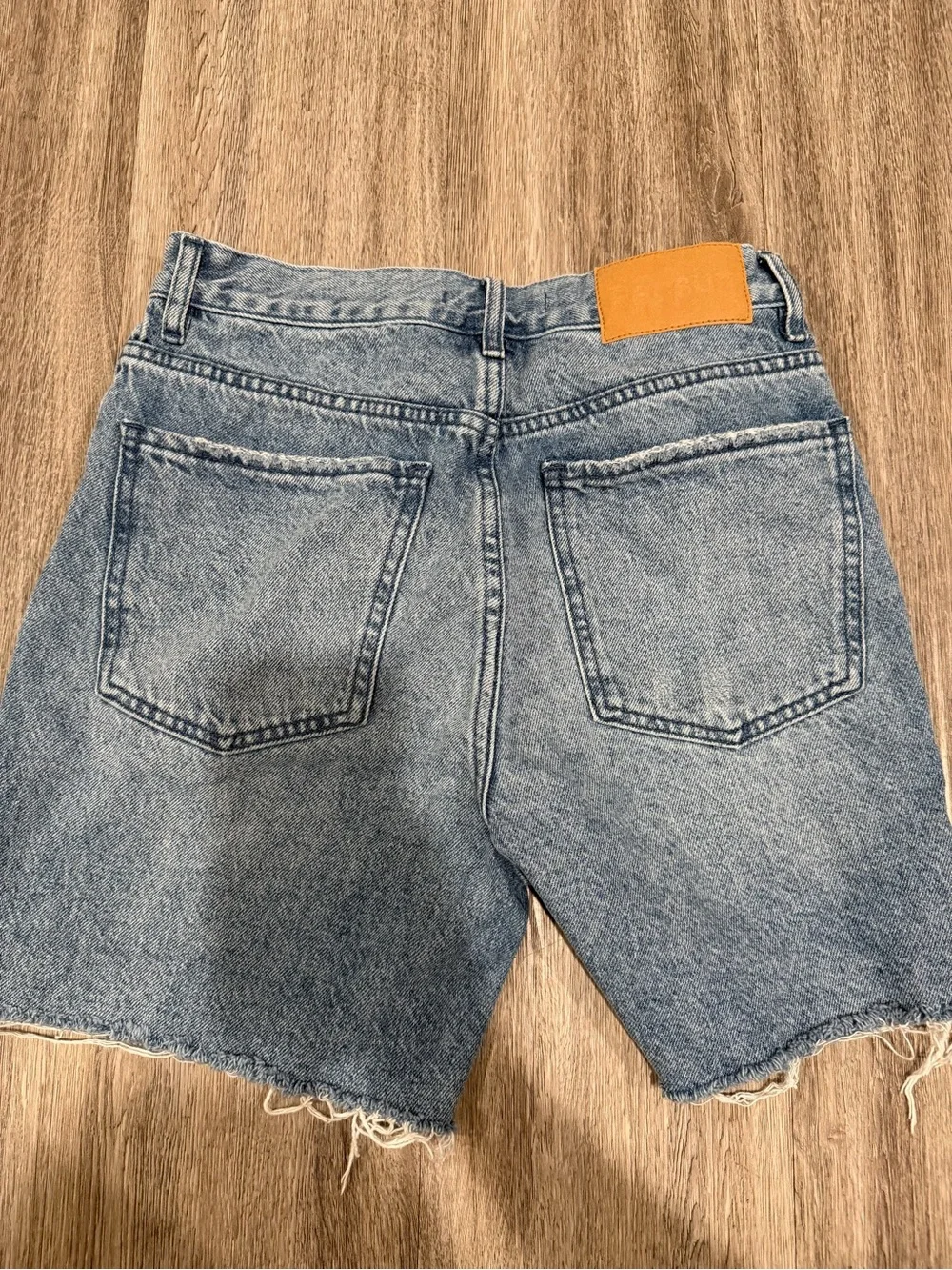 PacSun High-Rise Distressed Jean Shorts in Light Blue Wash